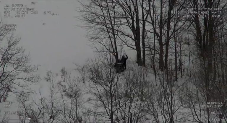 Dramatic video shows stranded sledder rescued by OPP helicopter